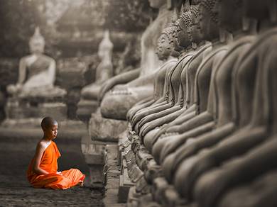 3AP4313-Young-Buddhist-Monk-praying-Thailand-(BW)-VINTAGE--Pangea-Images-