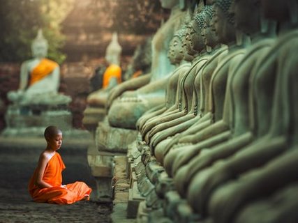 3AP3996-Young-Buddhist-Monk-praying-Thailand-VINTAGE--Pangea-Images-