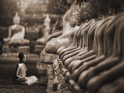 Image 3AP3997 Young Buddhist Monk praying Thailand (sepia) VINTAGE  Pangea Images 